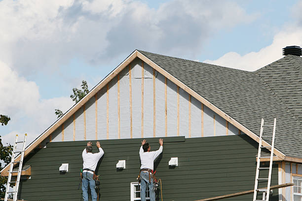Professional Siding technician working in Ashley, PA